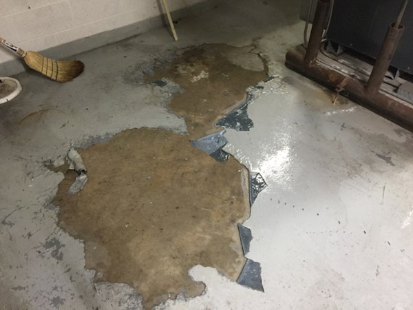 Surface Preparation — Utility Room Waterproofing & Repair